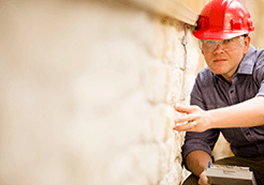 inspecting a foundation repair in GREATER TORONTO